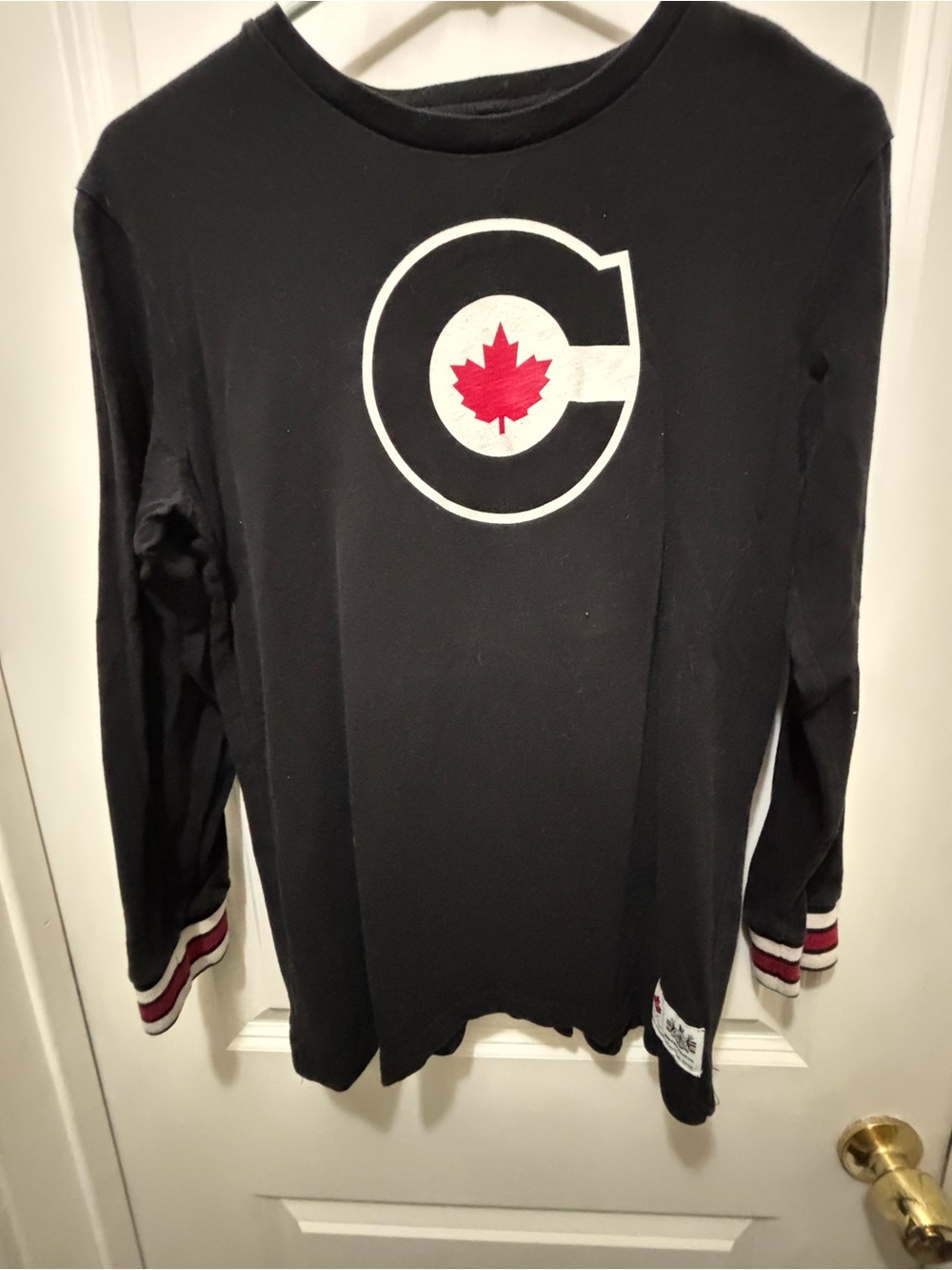 Roots Black Long Sleeve Hockey Tee with Red Maple Crest